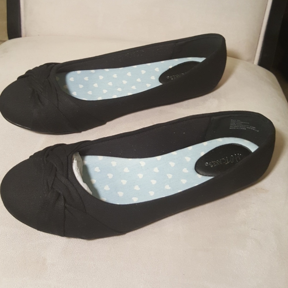 Black shoes made by Hotcakes